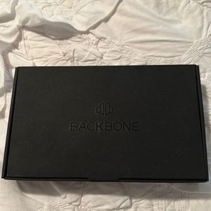 Backbone - essentially unused - box / instruction manual included